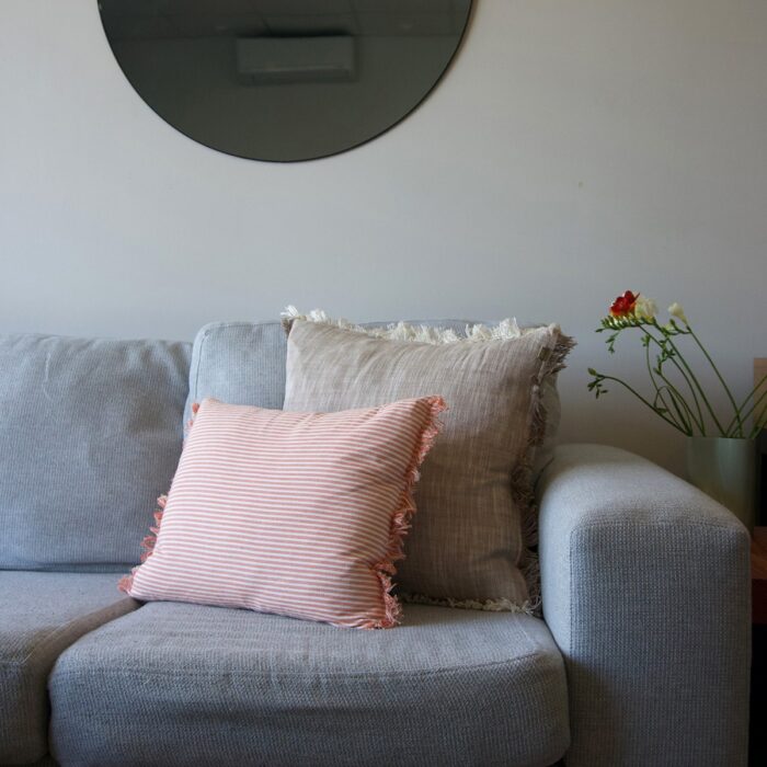 Abby Stripe Terracotta and Slub Chambray Stone cushions